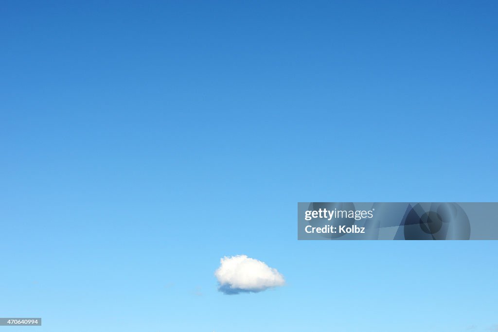 Single Cloud in Clear Blue Sky