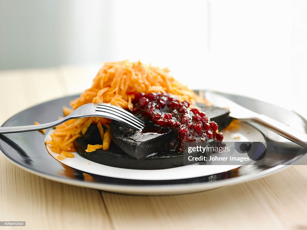 Swedish meal ""Blodpudding"" on plate