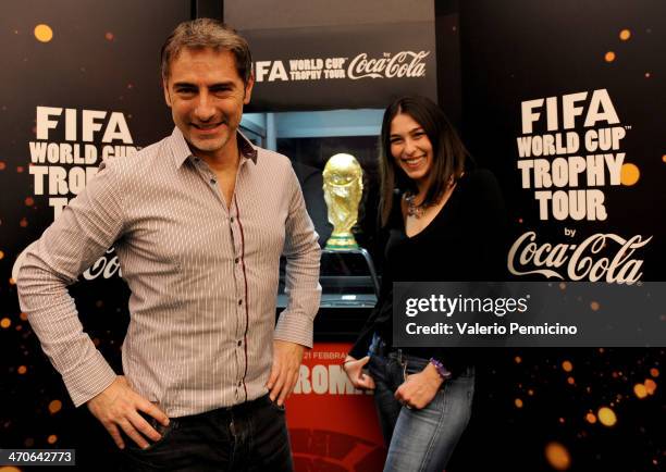 Marco Liorni and Chiara Papanicolau pose with FIFA World Cup trophy during day two of the FIFA World Cup Trophy Tour on February 20, 2014 in Rome,...