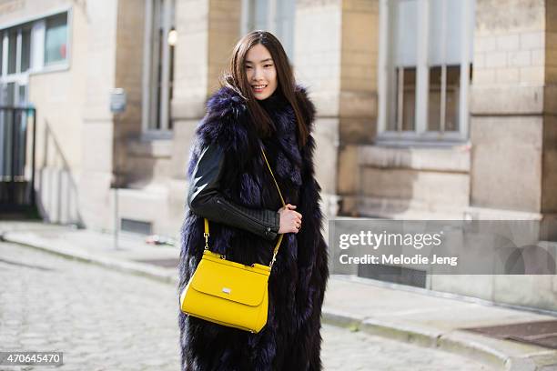 Model Dylan Xue exits the Haider Ackermann show in Shiatzy Chen on Day 5 of Paris Fashion Week PFW15 on March 7, 2015 in Paris, France.