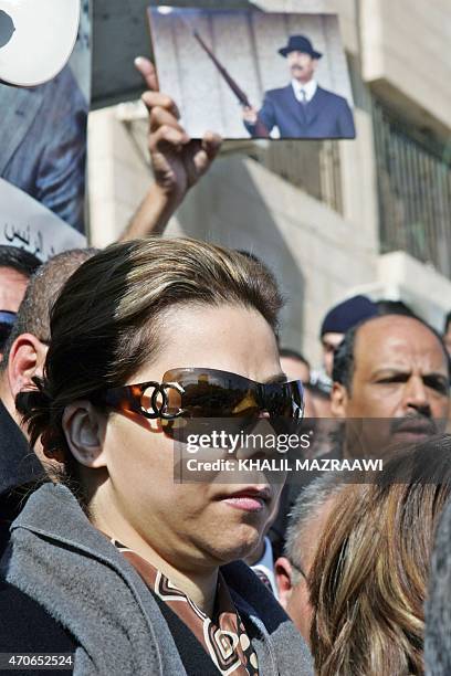 Raghad Saddam Hussein, the daughter of executed ousted Iraqi president Saddam Hussein, attends a protest held against her father's execution in the...