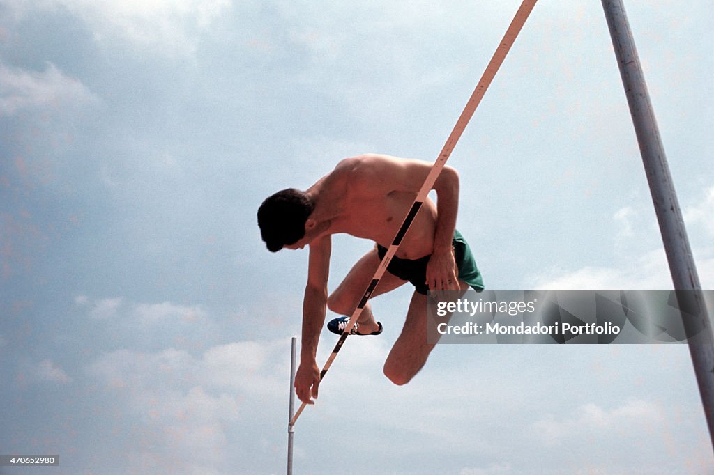 Lawrence Peckham does a high jump