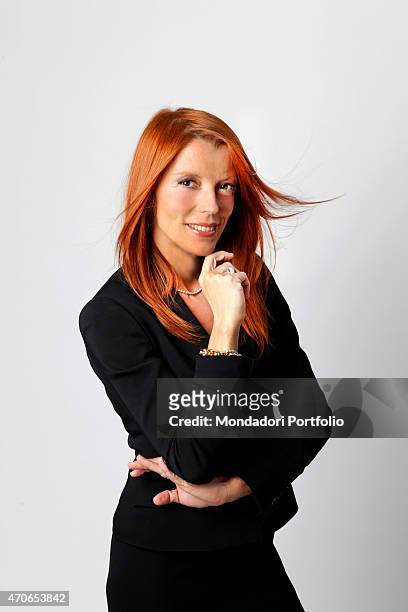 "The Italian Minister of Tourism, Michela Vittoria Brambilla, poses for the photo shoot in Milan at the Savoia Hotel where she resides during her...