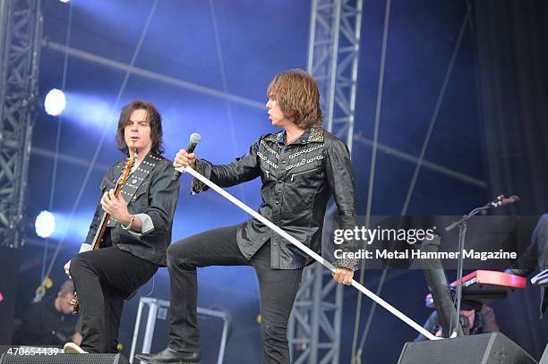 Joey Tempest and John Leven of Swedish hard rock group Europe performing live on the Zippo Encore Stage at Download Festival on June 14, 2013.