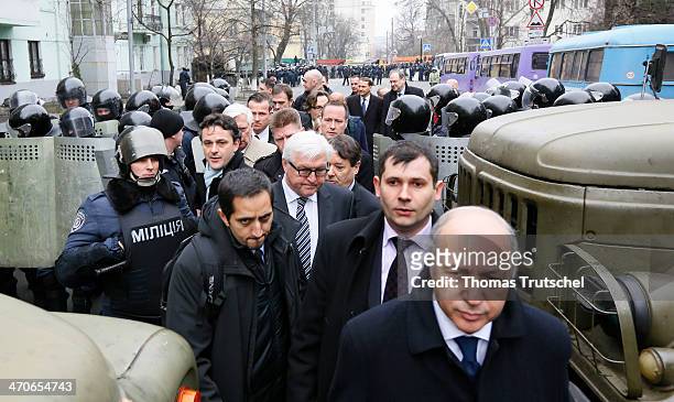 German Foreign Minister Frank-Walter Steinmeier and French Foreign Minister Laurent Fabius passes a roadblock on the way to the Ukrainian President...