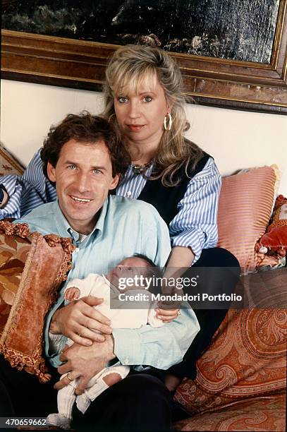 "Football player Franco Baresi, winner of two championships and two European Cups with his team AC Milan, poses on the sofa of his house with his...