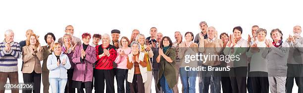 large group of happy senior men and women applauding. - clapping hands white background stock pictures, royalty-free photos & images