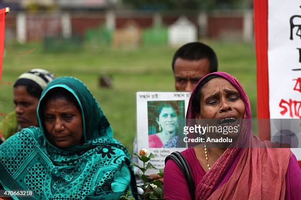 Relatives of the victims of Rana Plaza building collapse mourn at Jurain Graveyard on the second anniversary of Rana Plaza building collapse at...