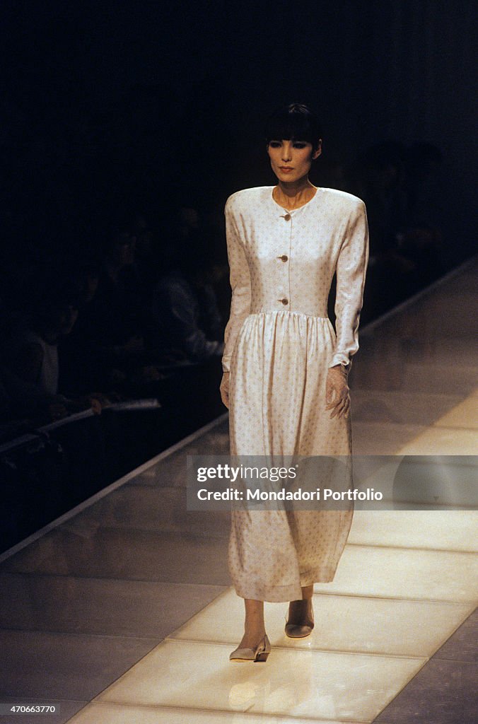 A dress by Armani during a fashion show