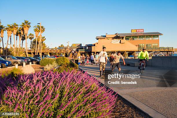 people being active at the ventura promenade and pier california - ventura stock pictures, royalty-free photos & images