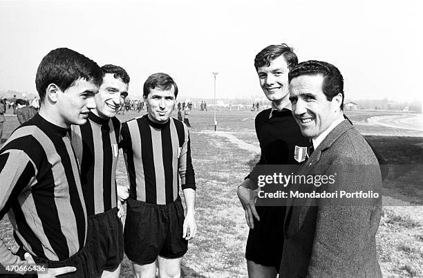 "Helenio Herrera, Argentinian but naturalized French football trainer, together with some Inter football players. Milan , 1966. "