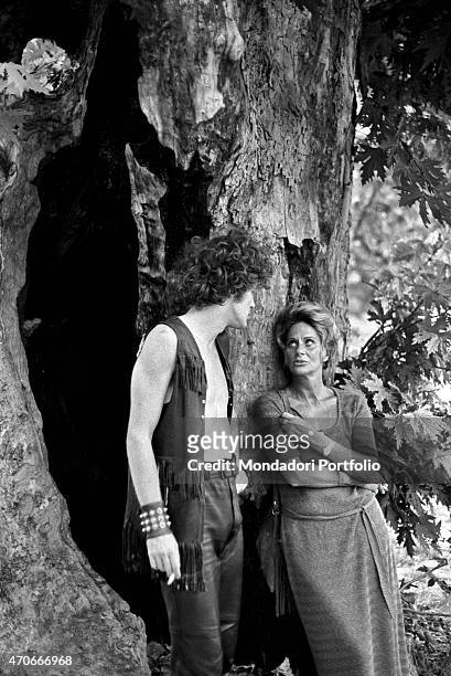 "Italian actress Alida Valli, born Alida Maria von Altenburger von Markenstein und Frauenberg, leans against a tree beside her son Carlo, who has...