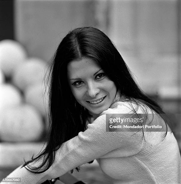 "Italian singer Rosanna Fratello looks at the camera smiling; she started her career at a tender age, then became famous thanks to a participation in...