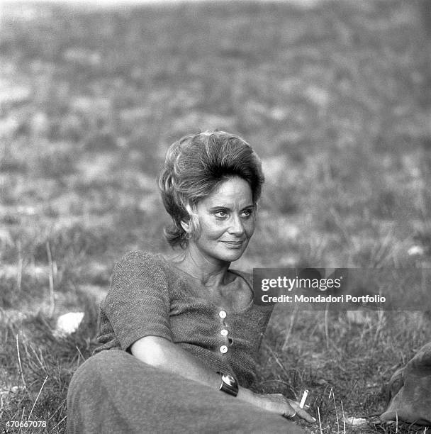 "Italian actress Alida Valli, born Alida Maria von Altenburger von Markenstein und Frauenberg, lies down on the grass and gazes into the distance...
