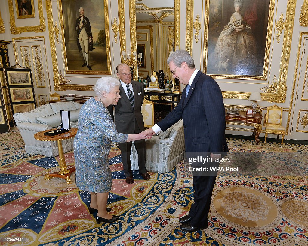 Queen Elizabeth II Presents The Insignia of A Knight of the Order of Australia To Prince Philip, Duke of Edinburgh