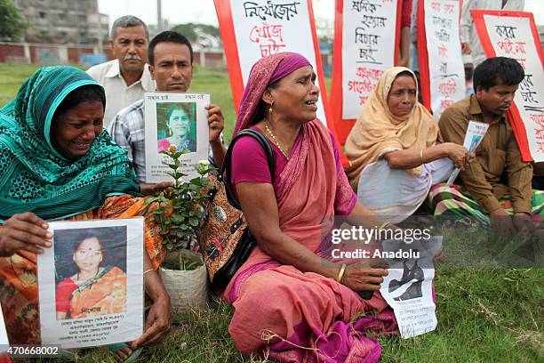 Relatives of the victims of Rana Plaza building collapse mourn at Jurain Graveyard on the second anniversary of Rana Plaza building collapse at...