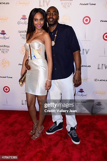 Ariel Meredith and Hakeem Nicks attend Sports Illustrated Hosts "Club SI" at LIV nightclub at Fontainebleau Miami on February 19, 2014 in Miami...