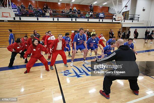 Milwaukee Bucks assistant coach Josh Oppenheimer interacts with participants during a Special Olympics basketball skills clinic on February 11, 2014...