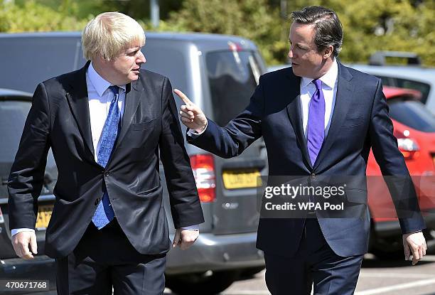 London Mayor Boris Johnson and Prime Minister David Cameron arrive at the Advantage children's daycare nursery on April 22, 2015 in Surbiton,...