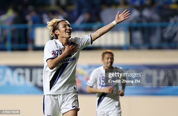 Takashi Usami of Gmaba Osaka celebrates his goal during the AFC Asian Champions League Group F match between Guangzhou R&F and Gamba Osaka at Yuexiu...