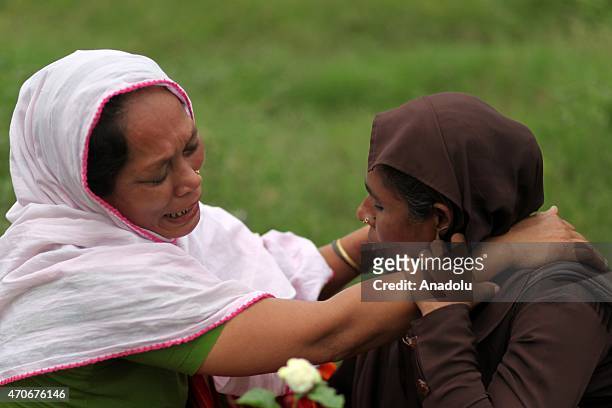 Relatives of the victims of Rana Plaza building collapse mourn at Jurain Graveyard on the second anniversary of Rana Plaza building collapse at...