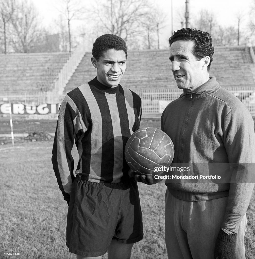Jair de Costa and Helenio Herrera on a soccer field