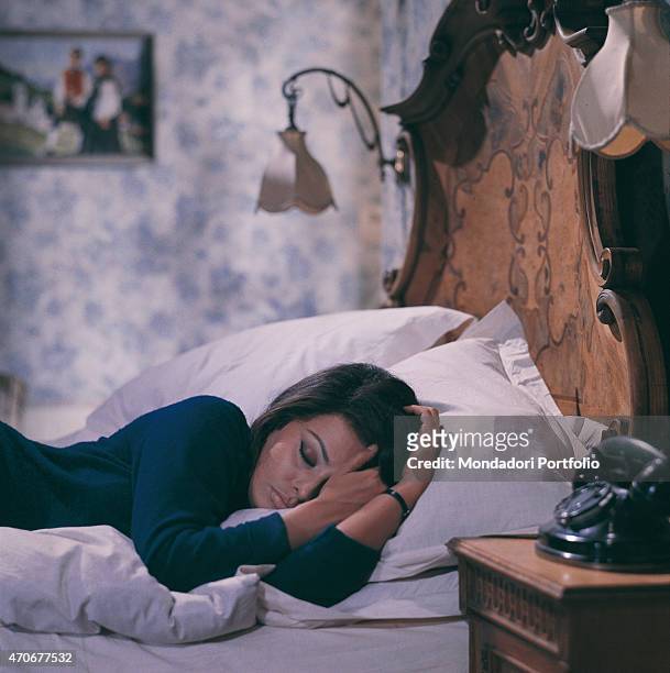 "Italian actress Sophia Loren relaxing on a bed while shooting the film Operation Crossbow at the Elstree Studios. United Kingdom, November 1964 "
