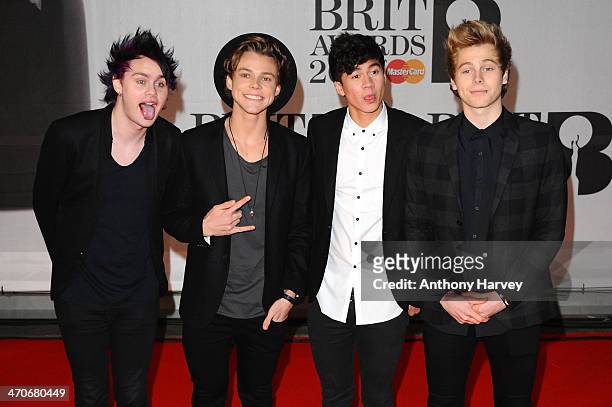 Michael Clifford, Ashton Irwin, Calum Hood and Luke Robert Hemmings of 5 Seconds Of Summer attend The BRIT Awards 2014 at 02 Arena on February 19,...