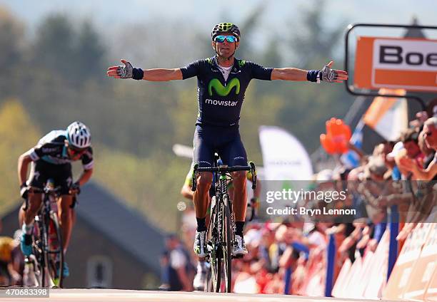 Alejandro Valverde of Spain and Movistar Team celebrates as he crosses the finish line to win the 79th La Fleche Wallonne from Waremme to Huy on...