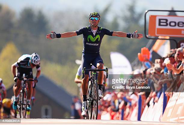 Alejandro Valverde of Spain and Movistar Team celebrates as he crosses the finish line to win the 79th La Fleche Wallonne from Waremme to Huy on...