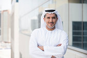 Arab businessman portrait outside office building