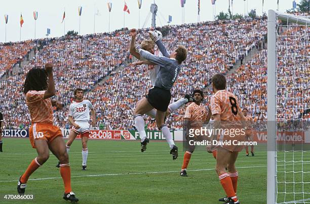 Hans van Breukelen of Netherlands makes a save as Oleksiy Mykhailychenko of USSR makes a challenge during the UEFA European Championships 1988 Final...