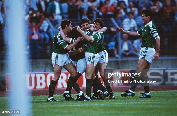 Ronnie Whelan of Republic of Ireland celebrates with team-mates after scoring a superb goal during the UEFA European Championships 1988 Group 2 match...