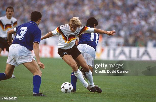 Jurgen Klinsmann of West Germany shields the ball from Giuseppe Bergomi and Fernando De Napoli of Italy during the UEFA European Championships 1988...
