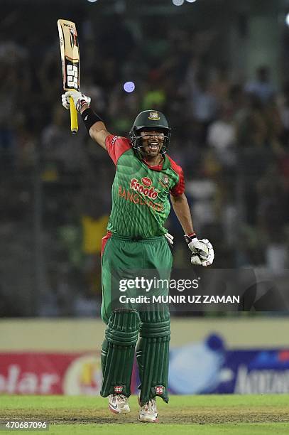 Bangladesh cricketer Soumya Sarkar reacts after scoring a century during the third One Day International cricket match between Bangladesh and...