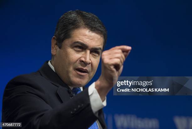 Honduran President Juan Orlando Hernandez speaks at a discussion on promoting peace and prosperity in Honduras at the Wilson Center in Washington,...