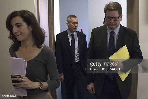 French Christian Sainte , head of French criminal police, and Paris Prosecutor Francois Molins arrive for a press conference at the Paris court on...