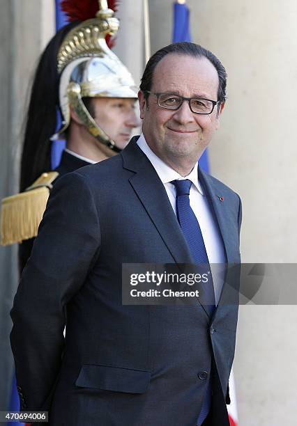 French President Francois Hollande waits for a meeting with Guinean President Alpha Conde at the Elysee Palace on April 22, 2015 in Paris, France.