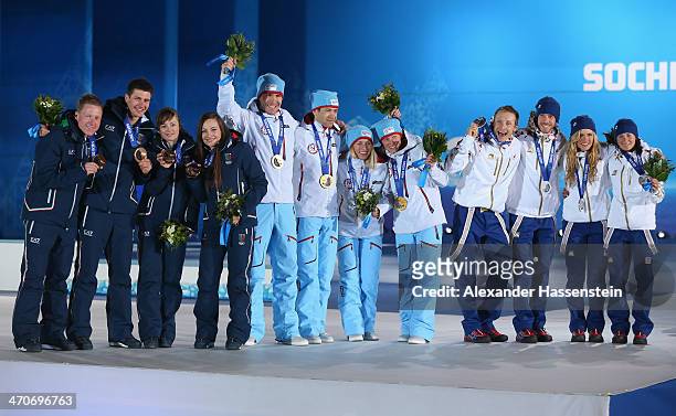 Bronze medalists Lukas Hofer, Dominik Windisch, Karin Oberhofer and Dorothea Wierer of Italy, gold medalists Emil Hegle Svendsen, Ole Einar...