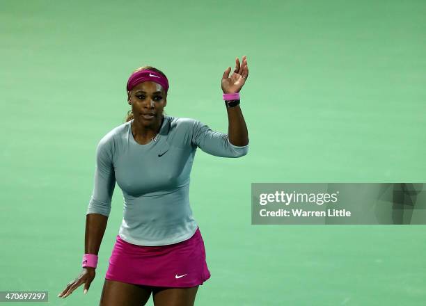 Serena Williams of the USA celebrates beating Jelena Jankovic of Serbia during day four of the WTA Dubai Duty Free Tennis Championships at the Dubai...