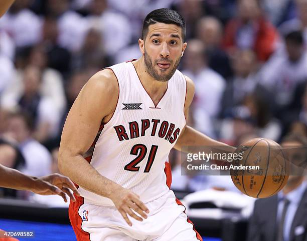 Greivis Vasquez of the Toronto Raptors drives to the basket against the Washington Wizards in Game Two of the NBA Eastern Conference Quarterfinals at...