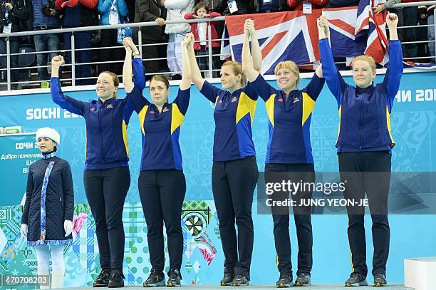 - Swedish silver medalists Agnes Knochenhauer, Maria Wennerstrom, Christina Bertrup, Maria Prytz and Margaretha Sigfridsson celebrate on the podium...