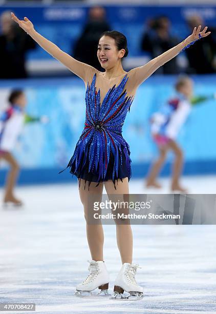 Mao Asada of Japan reacts after competing in the Figure Skating Ladies' Free Skating on day 13 of the Sochi 2014 Winter Olympics at Iceberg Skating...