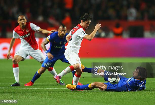 Bernardo Silva of Monaco is tackled by Andrea Pirlo of Juventus during the UEFA Champions League quarter-final second leg match between AS Monaco FC...