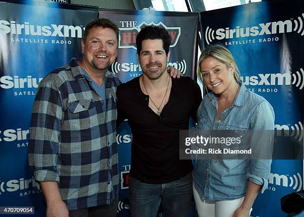 Storme Warren, JT Hodges and Storme show producer Brittany Davidson attend Singer/Songwriter JT Hodges visit to Mornings with Storme Warren on The...