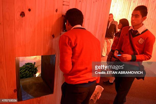 Schoolchildren visit a pavilion dedicated to Macondo, the fictitious town in which many of late Colombian Nobel laurate Gabriel Garcia Marquez's...