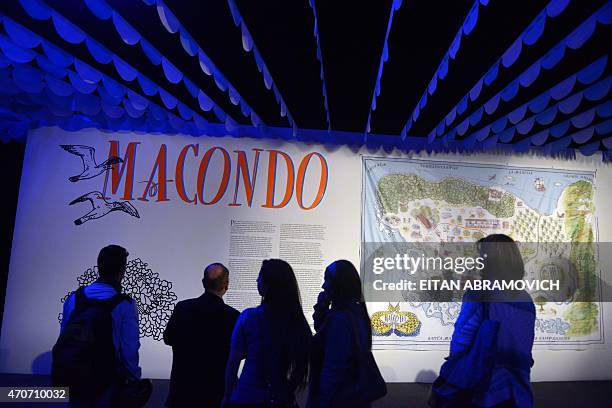 People visit a pavilion dedicated to Macondo, the fictitious town in which many of late Colombian Nobel laurate Gabriel Garcia Marquez's stories were...