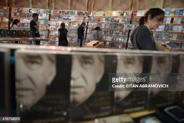 Visitors in a pavilion dedicated to Macondo, the fictitious town in which many of late Colombian Nobel laurate Gabriel Garcia Marquez's stories were...