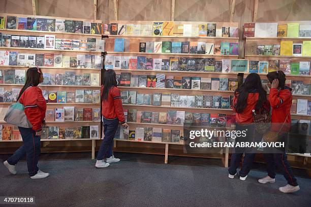 Schoolchildren visit a pavilion dedicated to Macondo, the fictitious town in which many of late Colombian Nobel laurate Gabriel Garcia Marquez's...