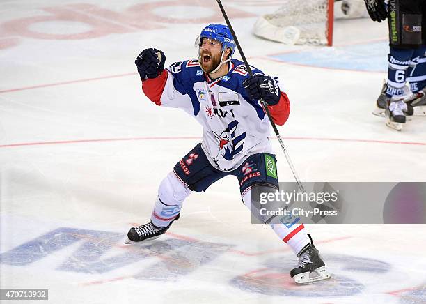 Andrew Joudrey of the Adler Mannheim celebrates after scoring the 1:2 during the game between ERC Ingolstadt and Adler Mannheim on April 22, 2015 in...
